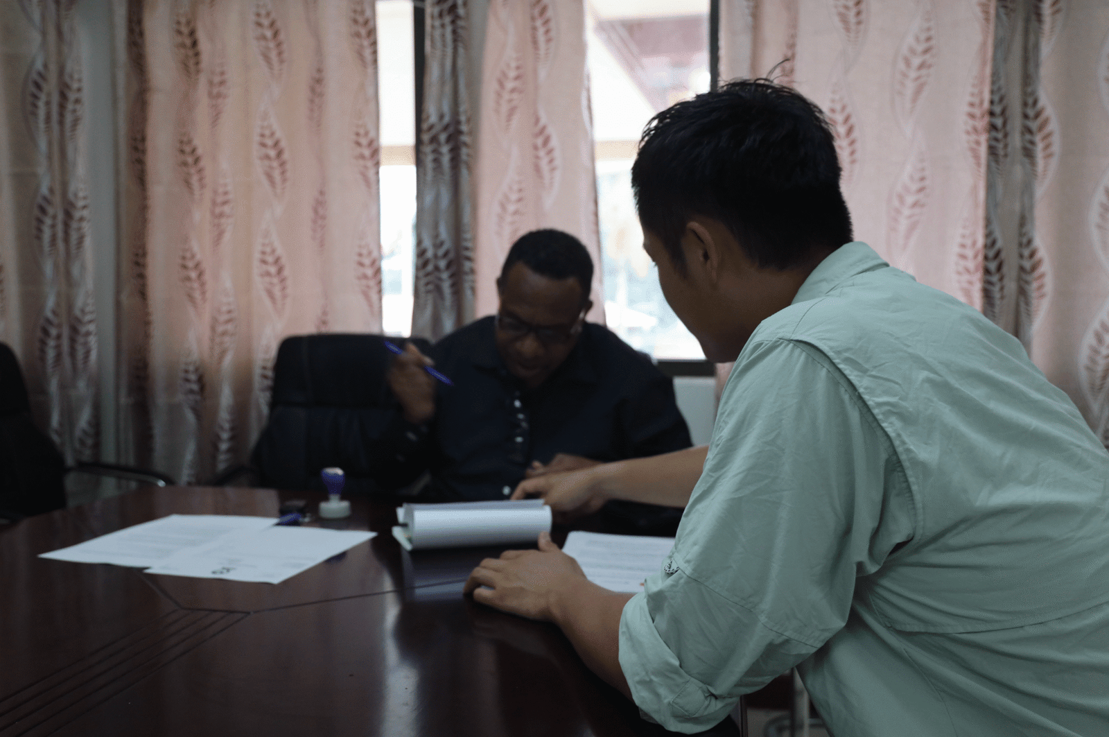 Government partners collaborating on sustainable development plans